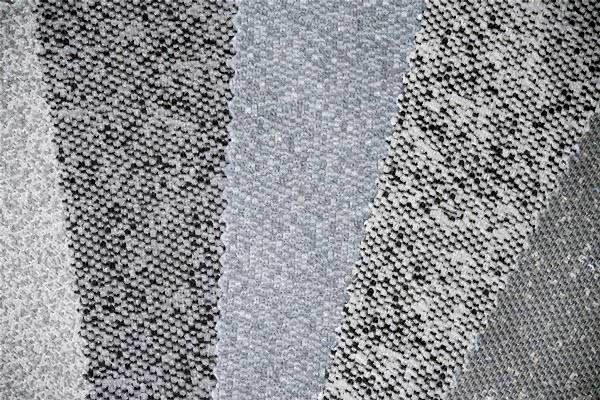 Gepunktete Musterungen verschiedener Vliesoberflächen